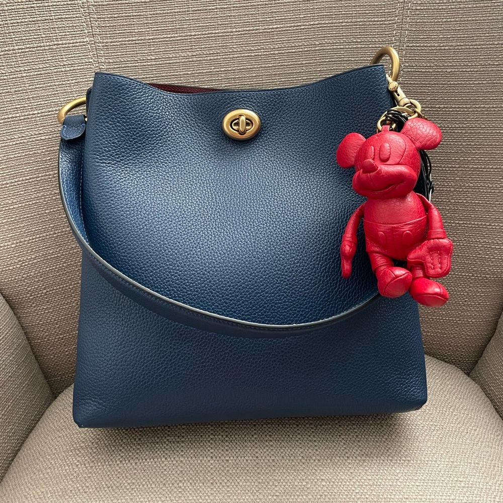 COACH CHARLIE BUCKET BAG IN GOLD/DEEP BLUE